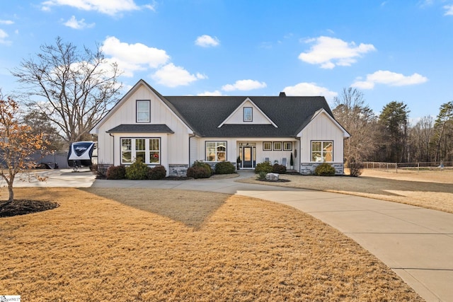 modern farmhouse with a front lawn