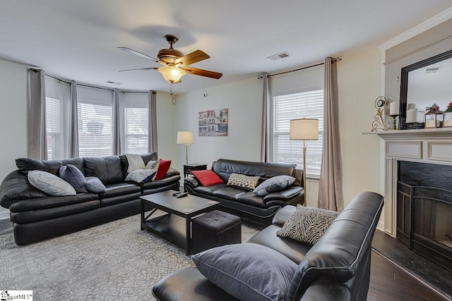 living room with dark hardwood / wood-style floors and ceiling fan