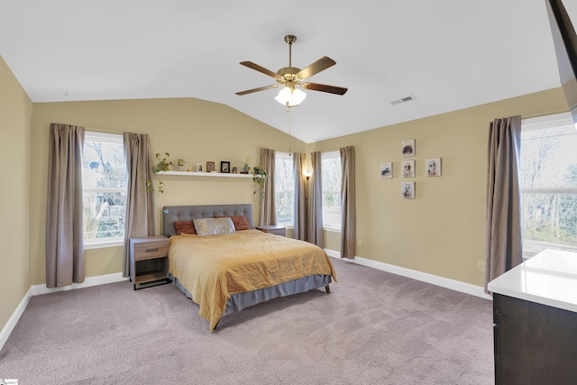 carpeted bedroom featuring lofted ceiling and ceiling fan