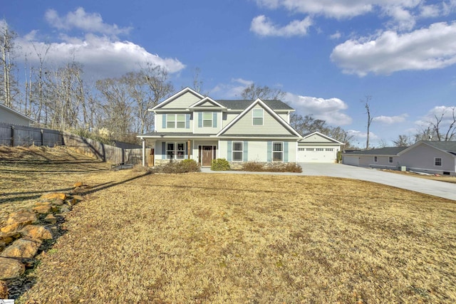 view of front of home with a front yard and covered porch