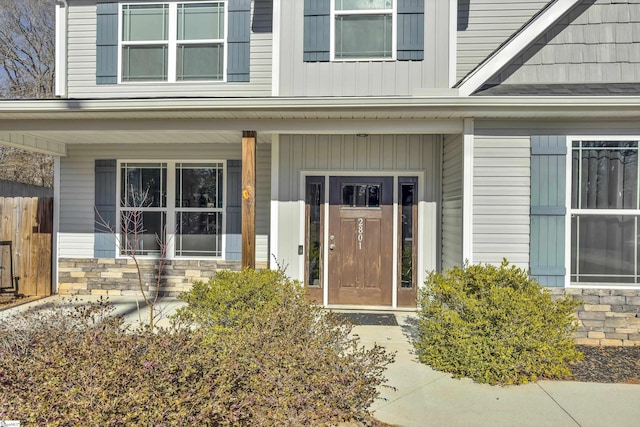 doorway to property featuring a porch