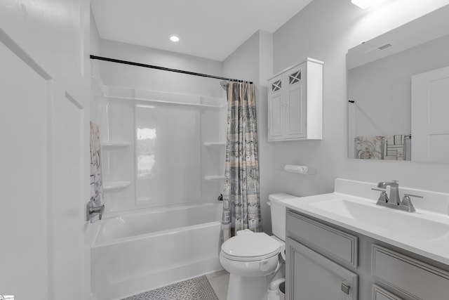 full bathroom featuring vanity, shower / bathtub combination with curtain, and toilet