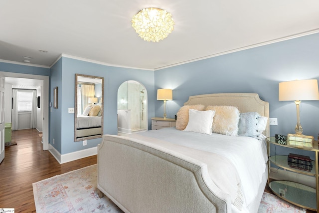 bedroom featuring hardwood / wood-style flooring and ornamental molding