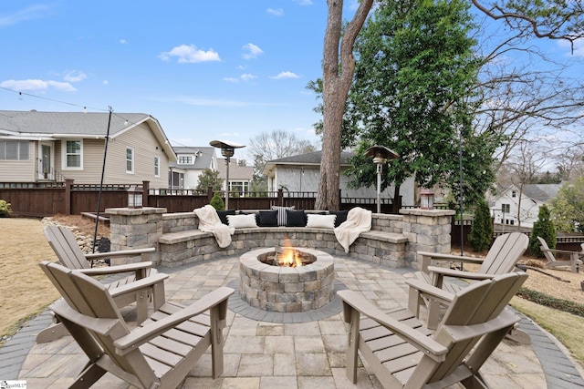 view of patio / terrace featuring an outdoor fire pit