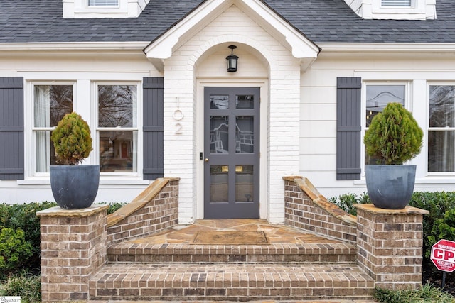 property entrance featuring french doors