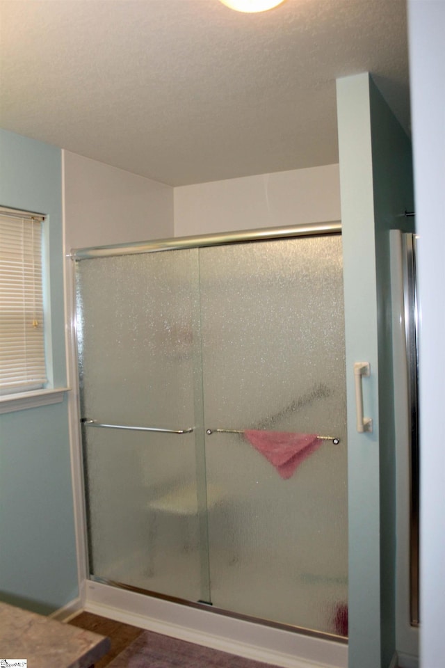 14 Heatherfield Dr, Simpsonville, SC 29680 - bathroom with a shower stall and wood finished floors