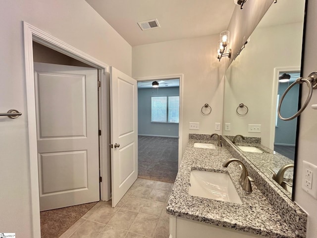 bathroom featuring vanity and tile patterned floors