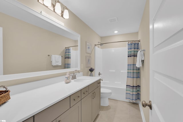 full bathroom featuring shower / bathtub combination with curtain, vanity, tile patterned floors, and toilet