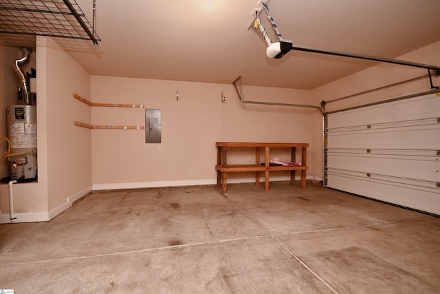 garage with a garage door opener, gas water heater, and electric panel