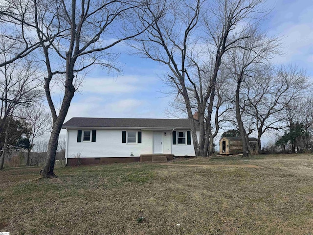 ranch-style house with a front yard