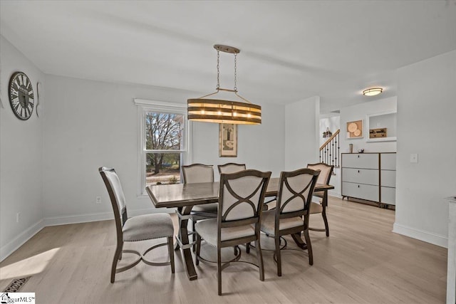 dining area featuring light hardwood / wood-style flooring