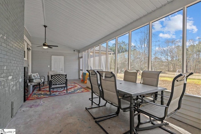 sunroom / solarium with vaulted ceiling and a wealth of natural light