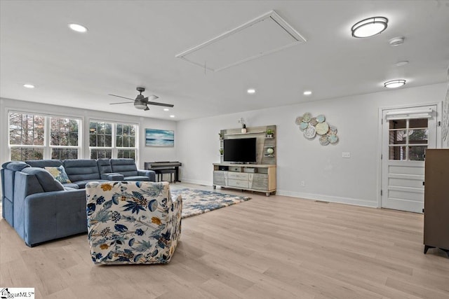 living room with light hardwood / wood-style floors