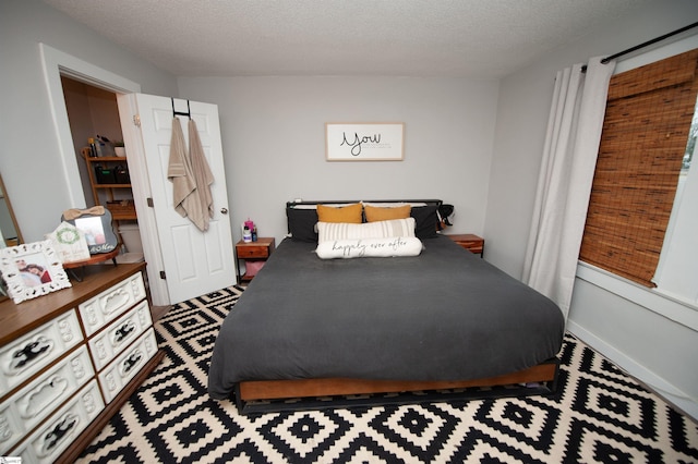 bedroom with a textured ceiling