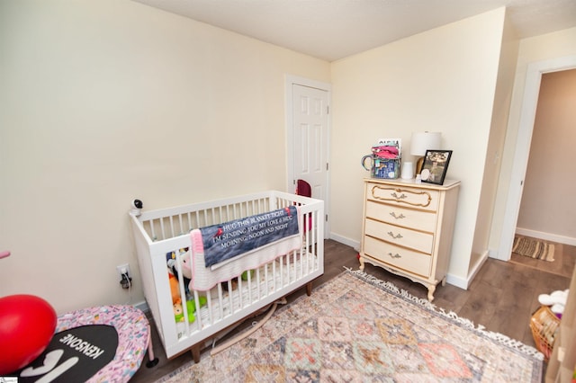 bedroom featuring dark wood-type flooring