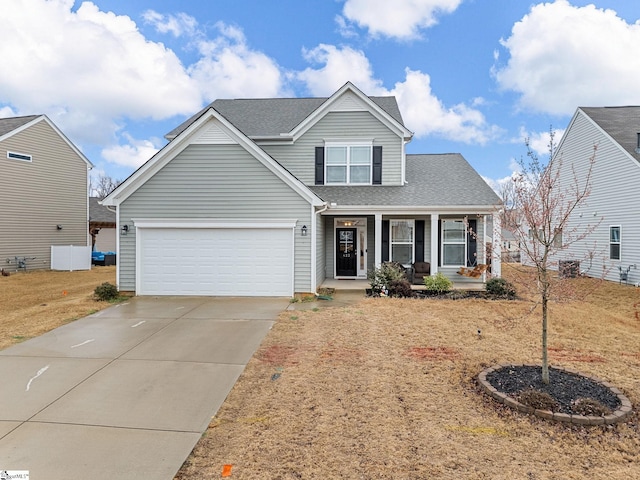 view of front of home with a garage and covered porch