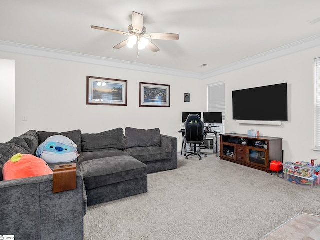 living room featuring crown molding, carpet flooring, and ceiling fan