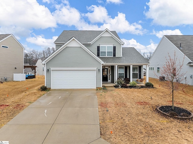 view of front of home with a porch and a garage