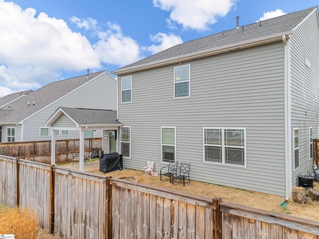 back of property featuring a patio area