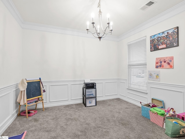 game room featuring light colored carpet, ornamental molding, and a notable chandelier