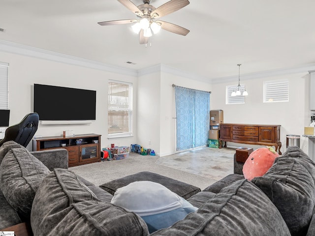 living room featuring ornamental molding and ceiling fan