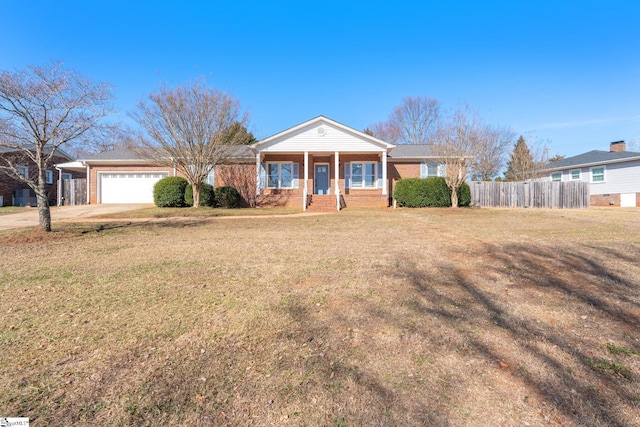 ranch-style house with a garage, a front yard, and a porch