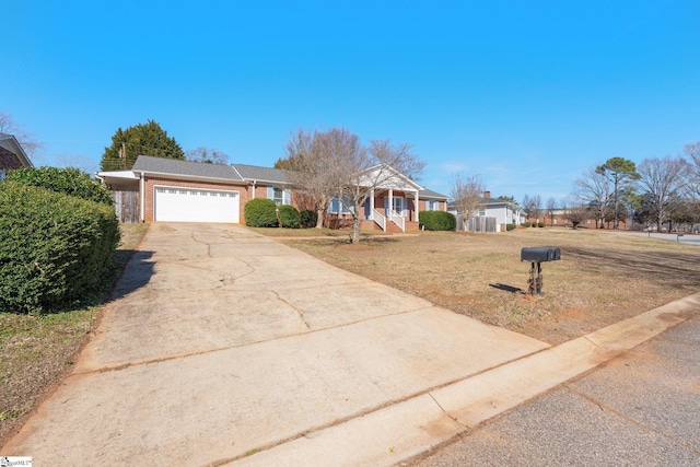 ranch-style home featuring a garage, a front yard, and a porch