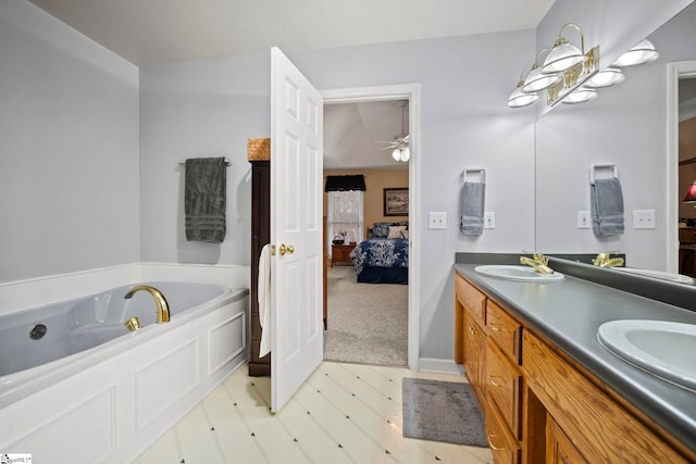 bathroom featuring vanity and a bathtub