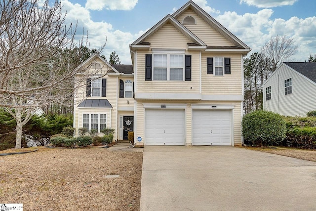 view of front of property with a garage