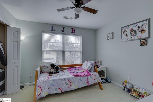 carpeted bedroom featuring ceiling fan