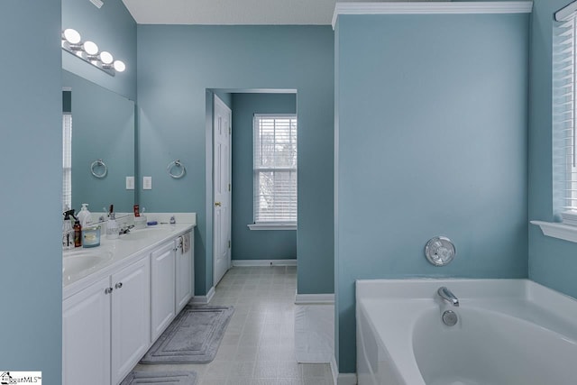 bathroom featuring a bathing tub and vanity