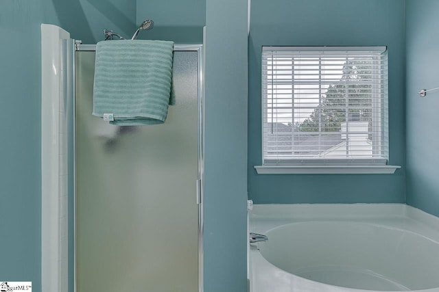 bathroom with independent shower and bath