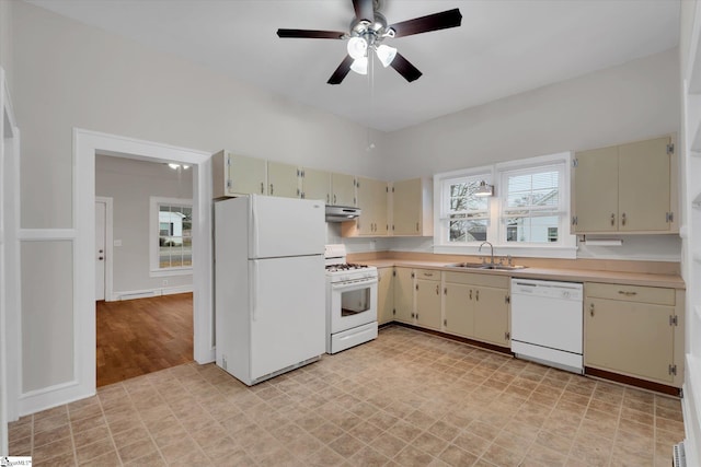 kitchen with ceiling fan, sink, white appliances, and cream cabinetry