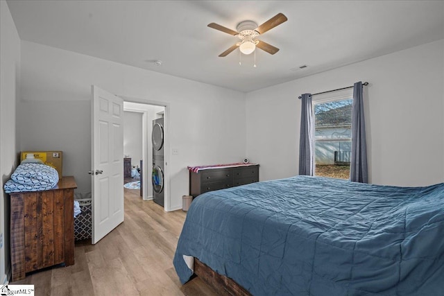 bedroom with ceiling fan and light hardwood / wood-style flooring