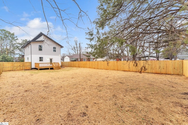 view of yard featuring a deck