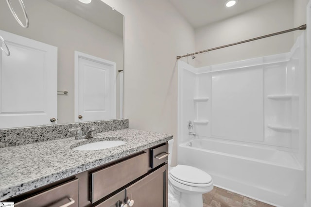 full bathroom with vanity, shower / washtub combination, and toilet