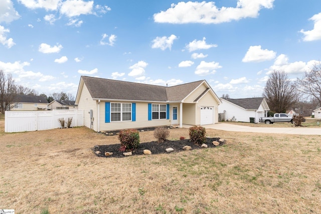 view of front of house with a garage and a front yard