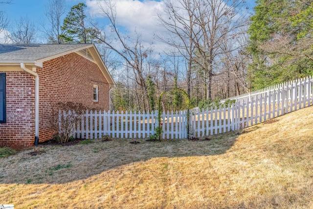 view of property exterior featuring a yard