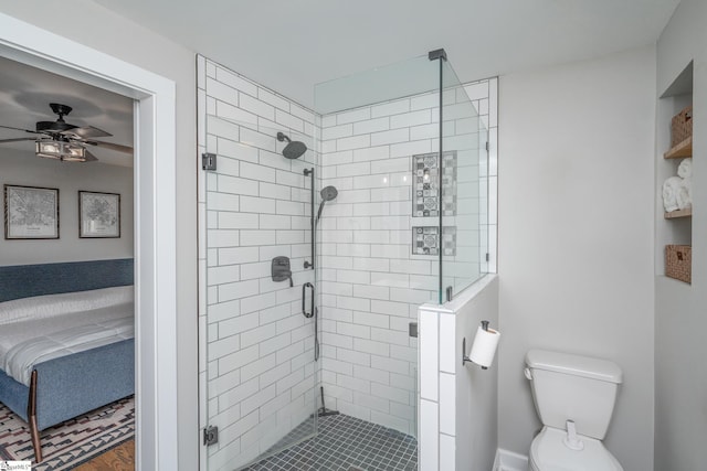 bathroom with walk in shower, ceiling fan, and toilet