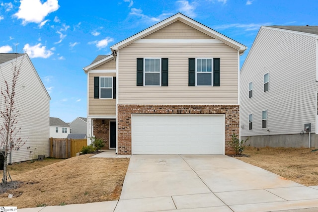 view of front of property with a garage