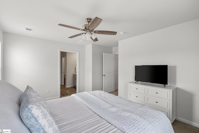 carpeted bedroom featuring ceiling fan