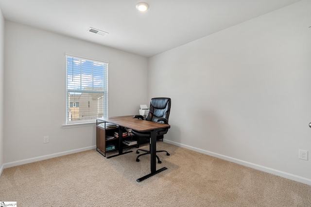 office featuring light colored carpet