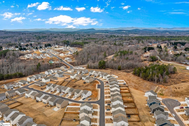 bird's eye view with a mountain view