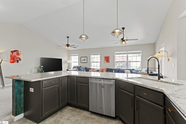 kitchen with sink, light stone countertops, kitchen peninsula, and dishwasher