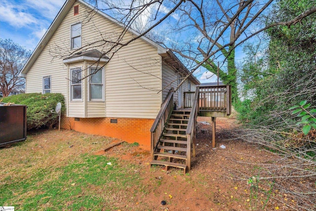 view of home's exterior with a deck