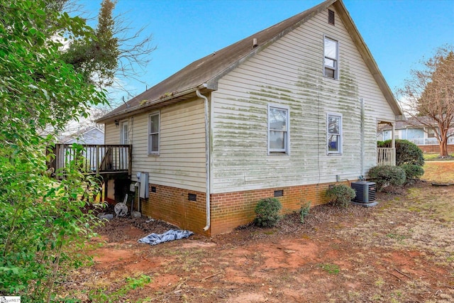 view of home's exterior with cooling unit