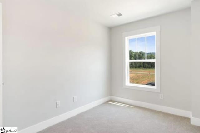 view of carpeted spare room