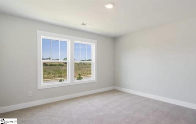 view of carpeted spare room