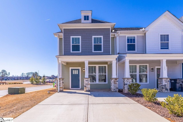 view of front of property featuring covered porch