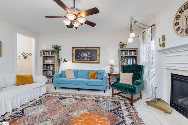 living room with carpet floors and ceiling fan